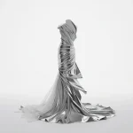 Futuristic Liquid-Metal Sculptural Gown in Infinite White Studio | chatgpt prompt